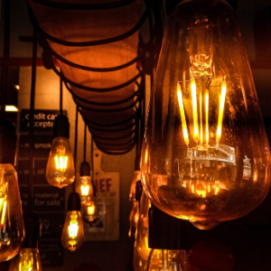 warm lighting light bulbs hanging from ceiling